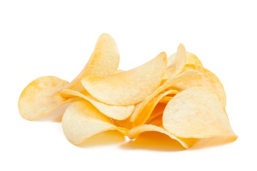 A heap of salted potato chip isolated on the white