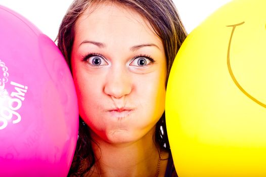 Woman with ballons in studio isolated on white