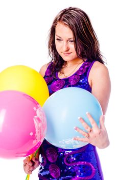 Woman with ballons in studio isolated on white