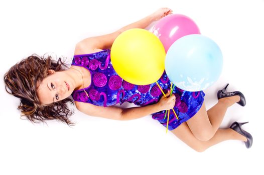 Woman with ballons in studio isolated on white