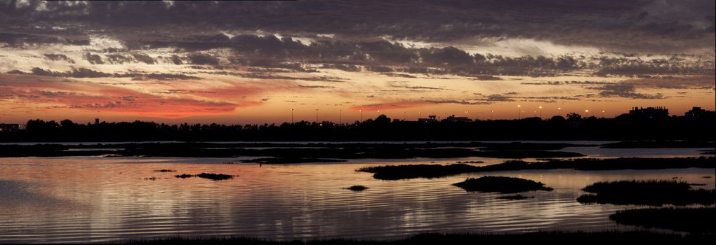 View of a beautiful sunset on the Ria Formosa region on the Algarve, Portugal.