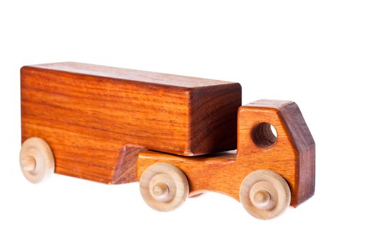 A funky retro wooden truck or semi-trailer. Isolated over white with clipping path.