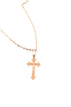 Golden cross with chain over white background