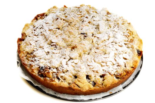 Baked apple pie with crumble and icing sugar
