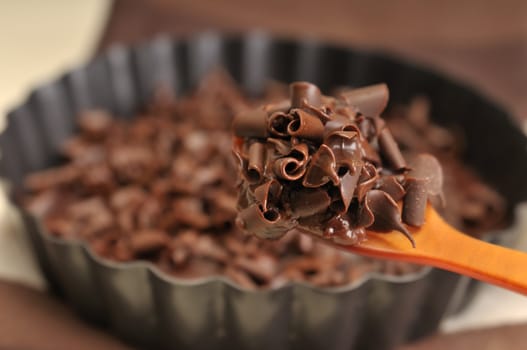 Chocolate rasps on a spoon