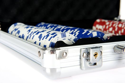 an aluminium poker suitcase on white