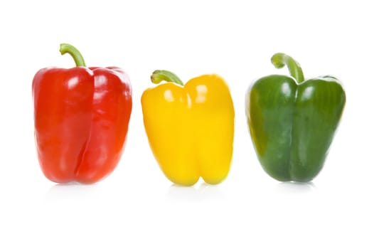 a red, a green and a yellow paprika