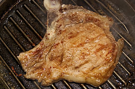 Pork chop on grill