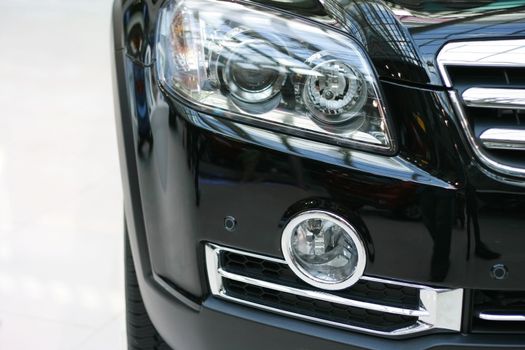 Close up of a modern car headlight assembly