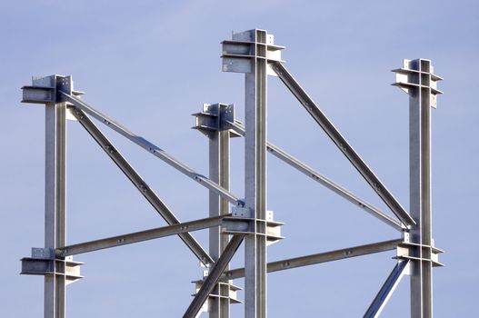 Steel framework against a blue sky