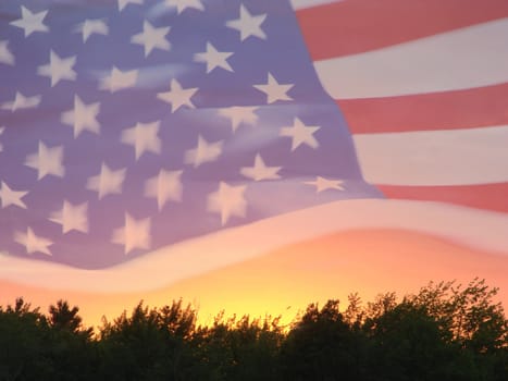 American flag floating in the wind and sunset as a background