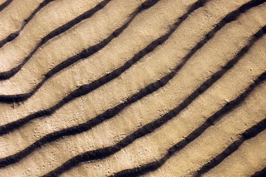 Lined sand waves on a beach