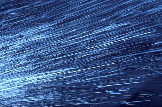 a abstract background of blue rays flowing