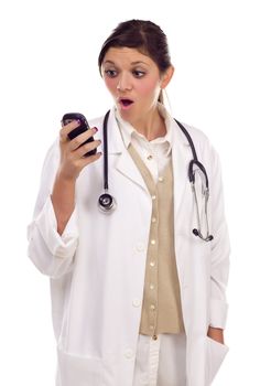 Pretty Ethnic Female Doctor or Nurse Reacting to Cell Phone Message Isolated on a White Background.