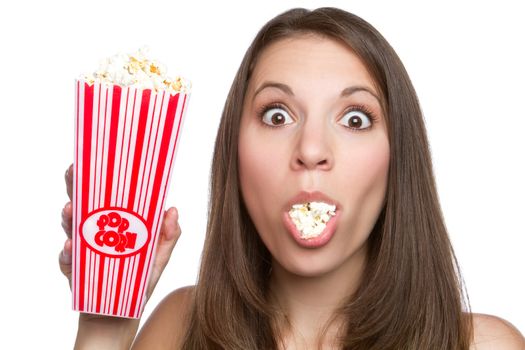 Beautiful young girl eating popcorn