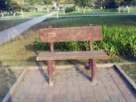 simple wooden chair in China park