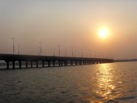 bridge under the sunset