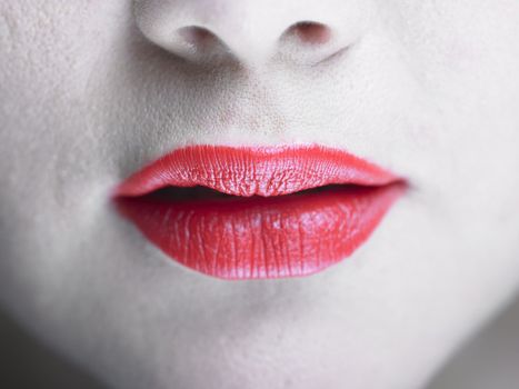 Beautiful Womans Sexy Red Lips with expression and makeup