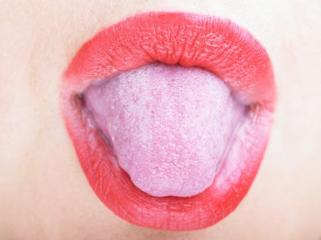 Woman's Red Lips and Teasing tongue