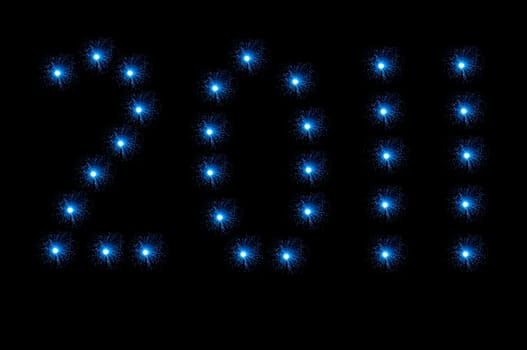 Many small blue illuminated fibre optic lamps arranged over white to spell the number 2011