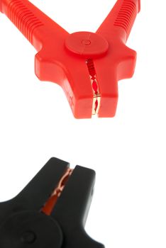 Red and black battery cables isolated on white background.