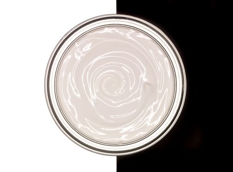 Paint can on black and white background