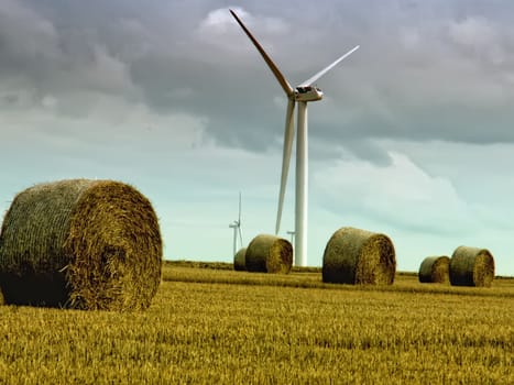 wind turbine and straw bale