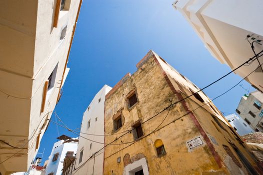 Old buildings lining the streets of spain. 