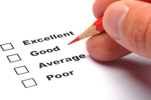 checkbox and red pen showing customer service survey or satisfaction concept to improve sales