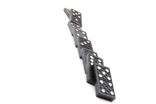 chain of dominoes isolated on a white background