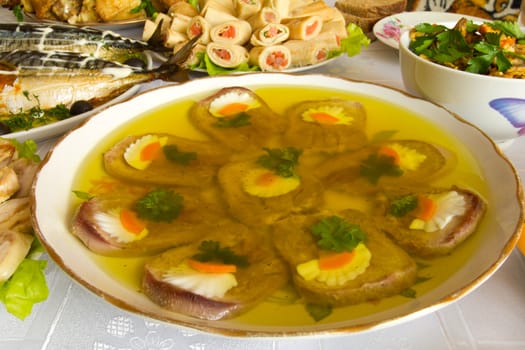 close-up pork tongue in jelly with decoration