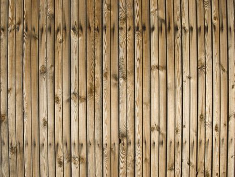 A background of weathered dark painted wood