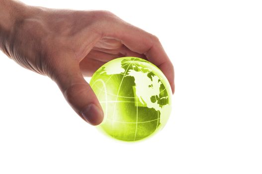 hand holding globe to protect the fragile environment