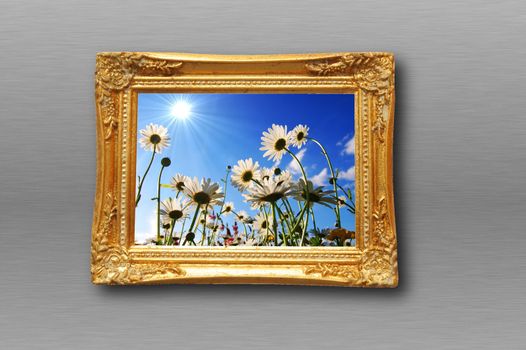 summer flowers and image frame on a wall