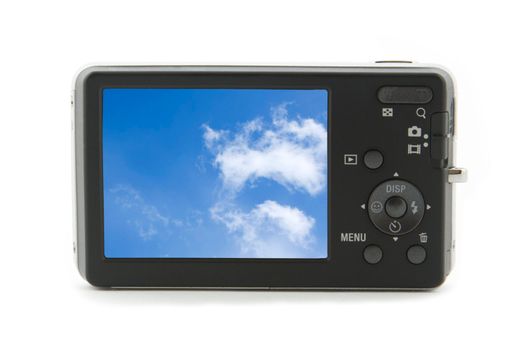 rear view of photo camera isolated on white background with picture of sky