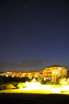 night sky with stars over the town or city and copyspace