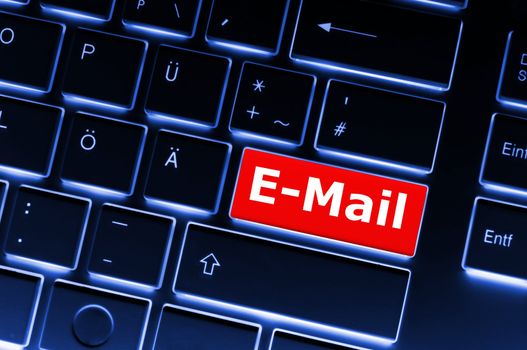 email e-mail or internet communication concept with key on keyboard