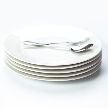 stack of white plates