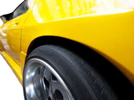 Yellow racing car isolated on pure white background