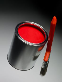 Red Paint can and brush on toned background