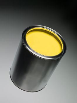 Yellow Paint can on toned background