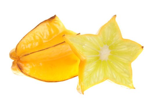 Genetic engineering - grapefruit inside of a carambola isolated on white background