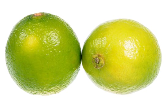 A couple of fresh limes isolated on white background