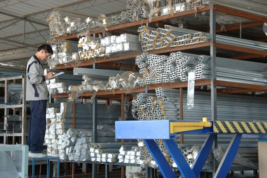 CANTON, CHINA - NOVEMBER 11: One of the biggest manufacturer of auto spray booths and generators in China. Car industry became very important element of Chinese economy growth. Factory tour on November 11, 2010.