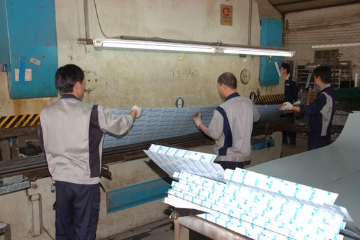 CANTON, CHINA - NOVEMBER 11: One of the biggest manufacturer of auto spray booths and generators in China. Car industry became very important element of Chinese economy growth. Factory tour on November 11, 2010.