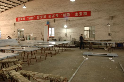 CANTON, CHINA - NOVEMBER 11: One of the biggest manufacturer of auto spray booths and generators in China. Car industry became very important element of Chinese economy growth. Factory tour on November 11, 2010.