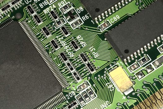 Close view detail of a circuit board with chips.