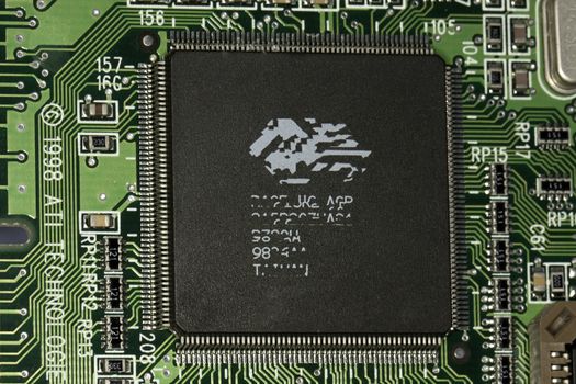 Close view detail of a circuit board with chips.