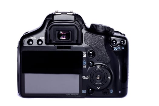 Close view of a modern photographic DSLR camera isolated on a white background.