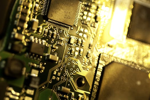 Close view detail of a circuit board with chips.